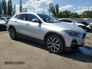 2021 BMW X2 sDrive28i z VIN WBXYH9C06M5S54903, wystawiony jako Copart lot #57177885 z przebiegiem 106 563 mil mil oraz Tytuł czysty. Historia ofert i sprzedaży dostępna na DreamBid. Obrazek 4.