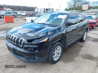 2014 Jeep Cherokee Latitude with VIN 1C4PJMCS6EW219999, listed as a IAAI auction lot 42044695 with 169,533 mi miles and . Bid and sale history available at carsss.com. Image 6.