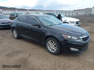 2012 Kia Optima LX with VIN KNAGM4A75C5297194, listed as a IAAI auction lot 41816301 with 119,064 mi miles. Bid and sale history available at carsss.com. Image 1.