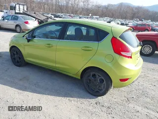 2011 Ford Fiesta SES with VIN 3FADP4FJ4BM108857, listed as a IAAI auction lot 41848272 with 138,943 mi miles. Bid and sale history available at carsss.com. Image 3.