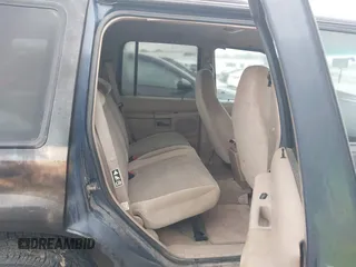 2000 Ford Explorer XLS z VIN 1FMZU62X7YZB81285, wystawiony jako IAAI lot #42720506 z przebiegiem 92 852 mil mil oraz . Historia ofert i sprzedaży dostępna na DreamBid. Obrazek 8.