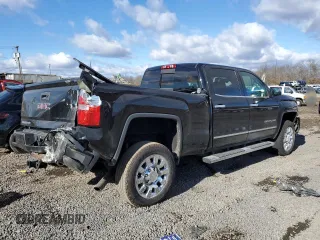 2017 GMC Sierra 2500HD Denali z VIN 1GT12UEG1HF104744, wystawiony jako Copart lot #43969425 z przebiegiem 129 674 mil mil oraz Szkoda całkowita • Salvage title. Historia ofert i sprzedaży dostępna na DreamBid. Obrazek 3.