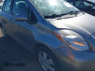 2010 Toyota Yaris with VIN JTDKT4K38A5285260, listed as a IAAI auction lot 41476373 with 104,358 mi miles. Bid and sale history available at carsss.com. Image 6.