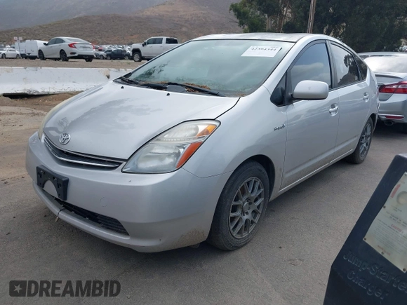 2008 Toyota Prius z VIN JTDKB20U483384506, wystawiony jako IAAI lot #42394344 z przebiegiem 208 150 mil mil oraz . Historia ofert i sprzedaży dostępna na DreamBid. Obrazek 2.