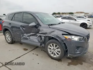 2016 Mazda CX-5 Touring z VIN JM3KE2CY7G0654292, wystawiony jako Copart lot #53433745 z przebiegiem 168 273 mil mil oraz Szkoda całkowita • Salvage title. Historia ofert i sprzedaży dostępna na DreamBid. Obrazek 4.
