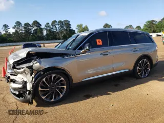 2023 Lincoln Aviator Reserve z VIN 5LM5J7WC7PGL10427, wystawiony jako Copart lot #52072055 z przebiegiem 51 265 mil mil oraz Szkoda całkowita • Salvage title. Historia ofert i sprzedaży dostępna na DreamBid. Obrazek 1.