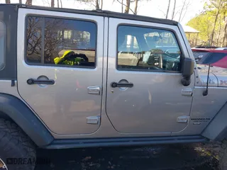 2015 Jeep Wrangler Unlimited Rubicon Hard Rock with VIN 1C4HJWFG1FL777222, listed as a IAAI auction lot 41843893 with 74,718 mi miles. Bid and sale history available at carsss.com. Image 13.