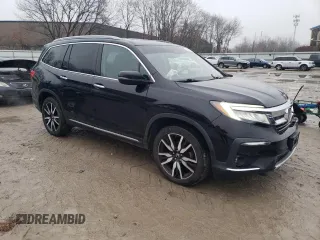 2020 Honda Pilot Touring 7-Passenger z VIN 5FNYF6H67LB003593, wystawiony jako Copart lot #83658334 z przebiegiem 105 575 mil mil oraz Szkoda całkowita • Salvage title. Historia ofert i sprzedaży dostępna na DreamBid. Obrazek 4.