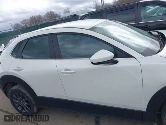 2023 Mazda CX-30 S z VIN 3MVDMBAM6PM572425, wystawiony jako IAAI lot #41833170 z przebiegiem 18 307 mil mil oraz . Historia ofert i sprzedaży dostępna na DreamBid. Obrazek 14.
