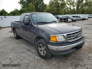 2004 Ford F-150 Heritage XL with VIN 2FTRX17214CA86322, listed as a Copart auction lot 69460684 with NaN miles and Salvage Title. Bid and sale history available at carsss.com. Image 4.