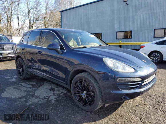 2012 Porsche Cayenne with VIN WP1AA2A20CLA02006, listed as a Copart auction lot 49129885 with 143,605 mi miles and Salvage title. Bid and sale history available at DreamBid. Image 4.