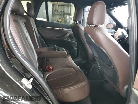 2017 BMW X1 xDrive28i z VIN WBXHT3Z39H4A57395, wystawiony jako Copart lot #56357845 z przebiegiem Nie podano mil oraz Szkoda całkowita • Salvage title. Historia ofert i sprzedaży dostępna na DreamBid. Obrazek 11.