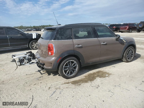 2015 MINI Cooper Countryman S with VIN WMWZC3C55FWT03673, listed as a Copart auction lot 87668635 with 90,508 mi miles and Salvage Title. Bid and sale history available at carsss.com. Image 3.