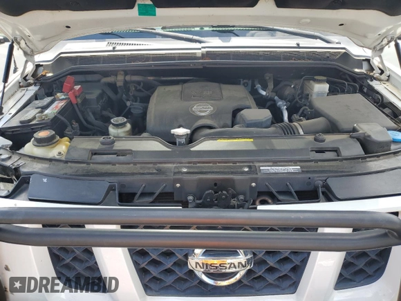 2012 Nissan Titan SV z VIN 1N6BA0EC2CN309207, wystawiony jako Copart lot #60451435 z przebiegiem 124 900 mil mil oraz Szkoda całkowita • Salvage title. Historia ofert i sprzedaży dostępna na DreamBid. Obrazek 11.