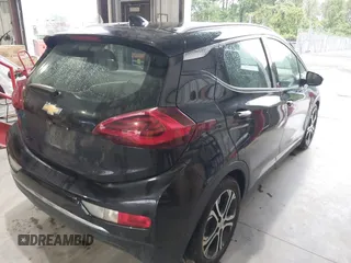 2019 Chevrolet Bolt EV Premier with VIN 1G1FZ6S09K4106306, listed as a IAAI auction lot 41947642 with 90,952 mi miles and . Bid and sale history available at DreamBid. Image 4.