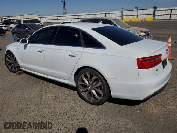2015 Audi A6 Prestige with VIN WAUHGAFC7FN030286, listed as a Copart auction lot 71237874 with 74,334 mi miles and Salvage title. Bid and sale history available at DreamBid. Image 2.