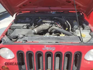 2011 Jeep Wrangler Sport with VIN 1J4AA2D19BL574527, listed as a Copart auction lot 49920225 with 121,730 mi miles and Clean Title. Bid and sale history available at carsss.com. Image 12.