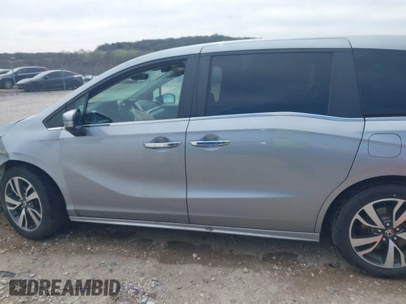 2021 Honda Odyssey Touring with VIN 5FNRL6H8XMB034837, listed as a IAAI auction lot 41856444 with 84,950 mi miles. Bid and sale history available at carsss.com. Image 14.