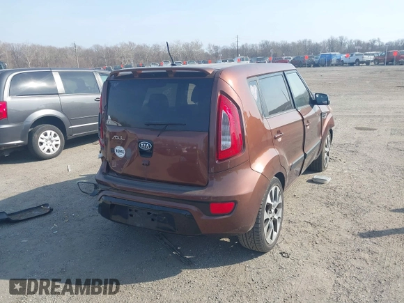 2012 Kia Soul + with VIN KNDJT2A6XC7422394, listed as a IAAI auction lot 41806315 with 165,268 mi miles. Bid and sale history available at carsss.com. Image 4.