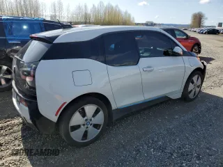 2014 BMW i3 with VIN WBY1Z4C57EV277634, listed as a Copart auction lot 51701885 with 0 mi miles and Salvage Title. Bid and sale history available at carsss.com. Image 3.