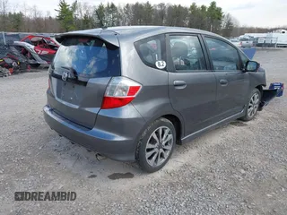 2013 Honda Fit Sport with VIN JHMGE8H54DC060946, listed as a IAAI auction lot 42095655 with 117,729 mi miles. Bid and sale history available at carsss.com. Image 4.