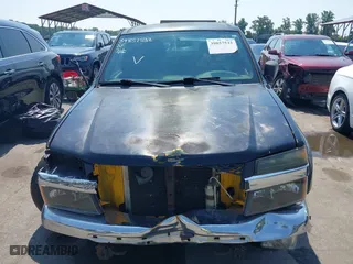 2005 Chevrolet Colorado LS Z71 with VIN 1GCDT196558120620, listed as a IAAI auction lot 39857532 with 201,457 mi miles. Bid and sale history available at carsss.com. Image 12.