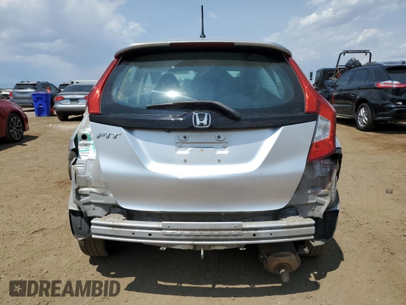 2015 Honda Fit LX with VIN 3HGGK5H59FM709104, listed as a Copart auction lot 63569065 with 101,859 mi miles and Salvage title. Bid and sale history available at DreamBid. Image 6.