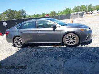 2016 Toyota Avalon Limited with VIN 4T1BK1EB4GU208979, listed as a IAAI auction lot 42032374 with 242,738 mi miles and . Bid and sale history available at carsss.com. Image 13.