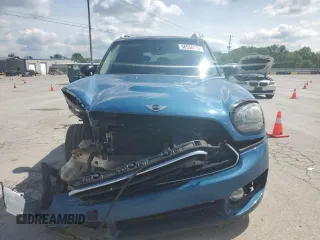 2018 MINI Countryman Cooper with VIN WMZYS7C36J3E08906, listed as a Copart auction lot 56538115 with 129,473 mi miles and Salvage title. Bid and sale history available at DreamBid. Image 5.
