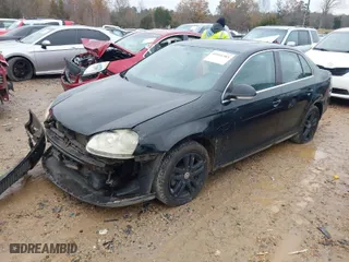 2006 Volkswagen Jetta Sedan 1.9L TDI with VIN 3VWST81K66M839068, listed as a IAAI auction lot 41041383 with 233,496 mi miles. Bid and sale history available at carsss.com. Image 2.