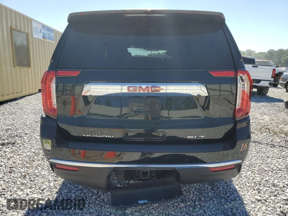 2023 GMC Yukon XL SLT with VIN 1GKS2GKDXPR254627, listed as a Copart auction lot 59226594 with 39,428 mi miles and Salvage Title. Bid and sale history available at DreamBid. Image 6.