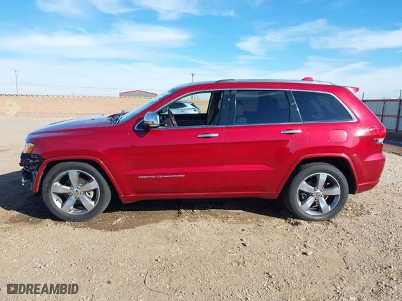 2014 Jeep Grand Cherokee Overland with VIN 1C4RJFCGXEC280970, listed as a IAAI auction lot 41504380 with 115,534 mi miles. Bid and sale history available at carsss.com. Image 14.