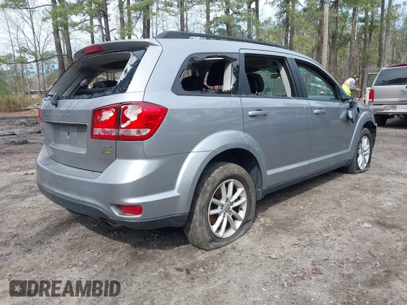 2015 Dodge Journey SXT with VIN 3C4PDCBG5FT696882, listed as a IAAI auction lot 41848362 with 175,039 mi miles and . Bid and sale history available at DreamBid. Image 4.