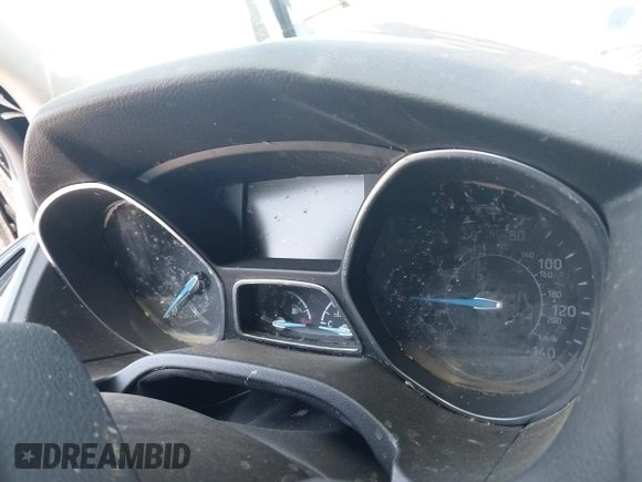 2018 Ford Focus SE z VIN 1FADP3FE9JL303933, wystawiony jako IAAI lot #42530171 z przebiegiem Nie podano mil oraz . Historia ofert i sprzedaży dostępna na DreamBid. Obrazek 14.