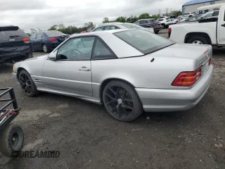 1999 Mercedes-Benz SL 500 with VIN WDBFA68F1XF177603, listed as a Copart auction lot 58983485 with 120,737 mi miles and Salvage title. Bid and sale history available at DreamBid. Image 2.
