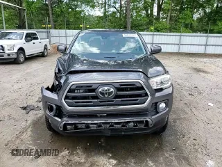 2018 Toyota Tacoma SR5 с VIN 5TFAZ5CN3JX071474, выставлен на аукционе Copart как лот 54677335 с пробегом 86 866 миль миль и Списание • Salvage title. История ставок и продаж доступна на DreamBid. Изображение 13.