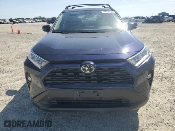 2020 Toyota RAV4 XLE with VIN 2T3W1RFV2LW074325, listed as a Copart auction lot 58693665 with 34,830 mi miles and Salvage title. Bid and sale history available at DreamBid. Image 5.