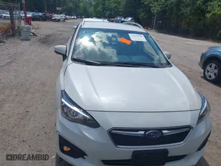 2017 Subaru Impreza Premium with VIN 4S3GTAD67H3748698, listed as a IAAI auction lot 39917558 with 56,945 mi miles. Bid and sale history available at carsss.com. Image 12.