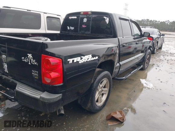 2007 Dodge Dakota SLT z VIN 1D7HW48P87S271192, wystawiony jako IAAI lot #41421142 z przebiegiem 198 588 mil mil oraz . Historia ofert i sprzedaży dostępna na DreamBid. Obrazek 4.