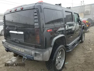 2003 Hummer H2 with VIN 5GRGN23U83H143843, listed as a Copart auction lot 43792915 with 115,569 mi miles and Salvage Title. Bid and sale history available at carsss.com. Image 3.