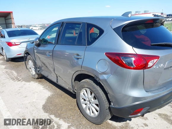 2013 Mazda CX-5 Touring with VIN JM3KE2CE6D0164430, listed as a IAAI auction lot 41961655 with 194,278 mi miles. Bid and sale history available at carsss.com. Image 18.