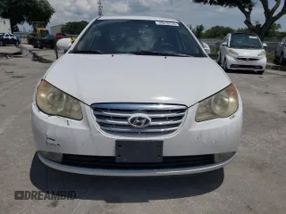 2010 Hyundai Elantra GLS with VIN KMHDU4AD2AU889047, listed as a Copart auction lot 59210735 with 307,475 mi miles and Salvage title. Bid and sale history available at DreamBid. Image 5.