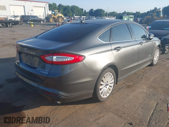 2016 Ford Fusion SE Hybrid с VIN 3FA6P0LU9GR285513, выставлен на аукционе IAAI как лот 42796945 с пробегом 150 697 миль миль и . История ставок и продаж доступна на DreamBid. Изображение 4.