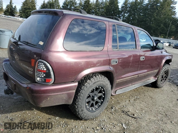 2003 Dodge Durango SLT Plus z VIN 1D4HS58N33F612272, wystawiony jako Copart lot #45331435 z przebiegiem 183 750 mil mil oraz Szkoda całkowita • Salvage title. Historia ofert i sprzedaży dostępna na DreamBid. Obrazek 3.