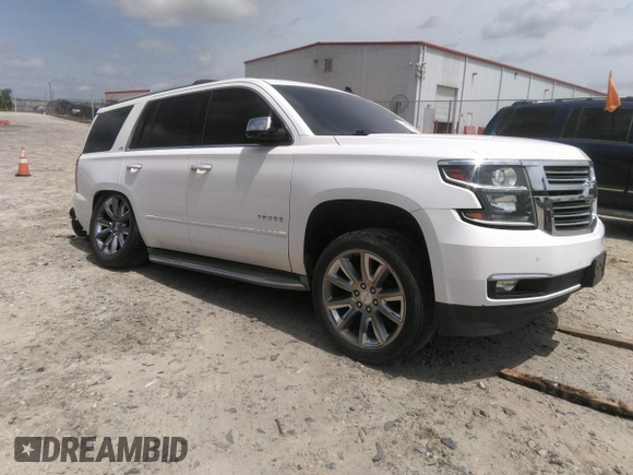 2015 Chevrolet Tahoe LTZ z VIN 1GNSKCKC5FR177134, wystawiony jako IAAI lot #41460583 z przebiegiem 202 924 mil mil oraz . Historia ofert i sprzedaży dostępna na DreamBid. Obrazek 1.