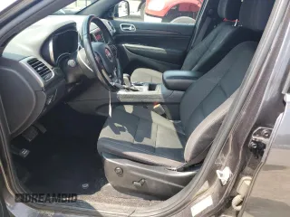 2020 Jeep Grand Cherokee Laredo E with VIN 1C4RJFAGXLC143334, listed as a Copart auction lot 60437345 with 62,484 mi miles and Salvage title. Bid and sale history available at DreamBid. Image 7.