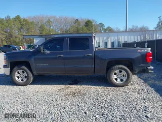 2014 Chevrolet Silverado 1500 LT with VIN 3GCUKREC6EG553001, listed as a IAAI auction lot 41415936 with 254,622 mi miles. Bid and sale history available at carsss.com. Image 14.