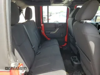 2016 Jeep Wrangler Unlimited Sport z VIN 1C4BJWDG9GL302542, wystawiony jako Copart lot #63942405 z przebiegiem 174 632 mil mil oraz Czysty tytuł • Clean title. Historia ofert i sprzedaży dostępna na DreamBid. Obrazek 11.