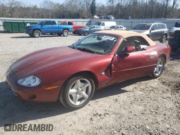 1999 Jaguar XK z VIN SAJGX2043XC032962, wystawiony jako Copart lot #49312155 z przebiegiem 74 662 mil mil oraz Szkoda całkowita • Salvage title. Historia ofert i sprzedaży dostępna na DreamBid. Obrazek 1.