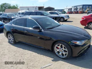 2021 Alfa Romeo Giulia Ti Sport with VIN ZARFAMBN2M7649941, listed as a IAAI auction lot 41912686 with 77,626 mi miles and . Bid and sale history available at DreamBid. Image 13.